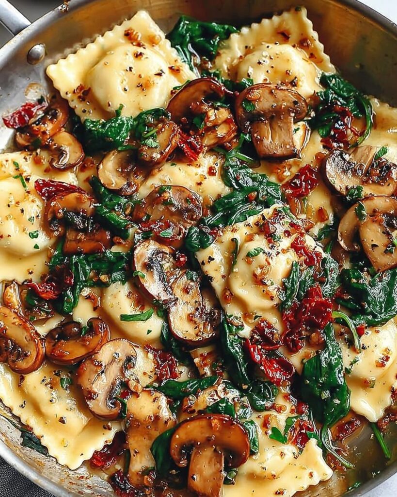 Cheesy Ravioli with Spinach Mushrooms and Sun Dried Tomatoes