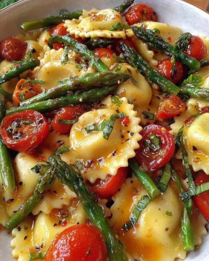 Fresh Ravioli with Spring Asparagus and Herb-Tomato Sauce 1 Ravioli with Tomatoes Asparagus Garlic and Herbs