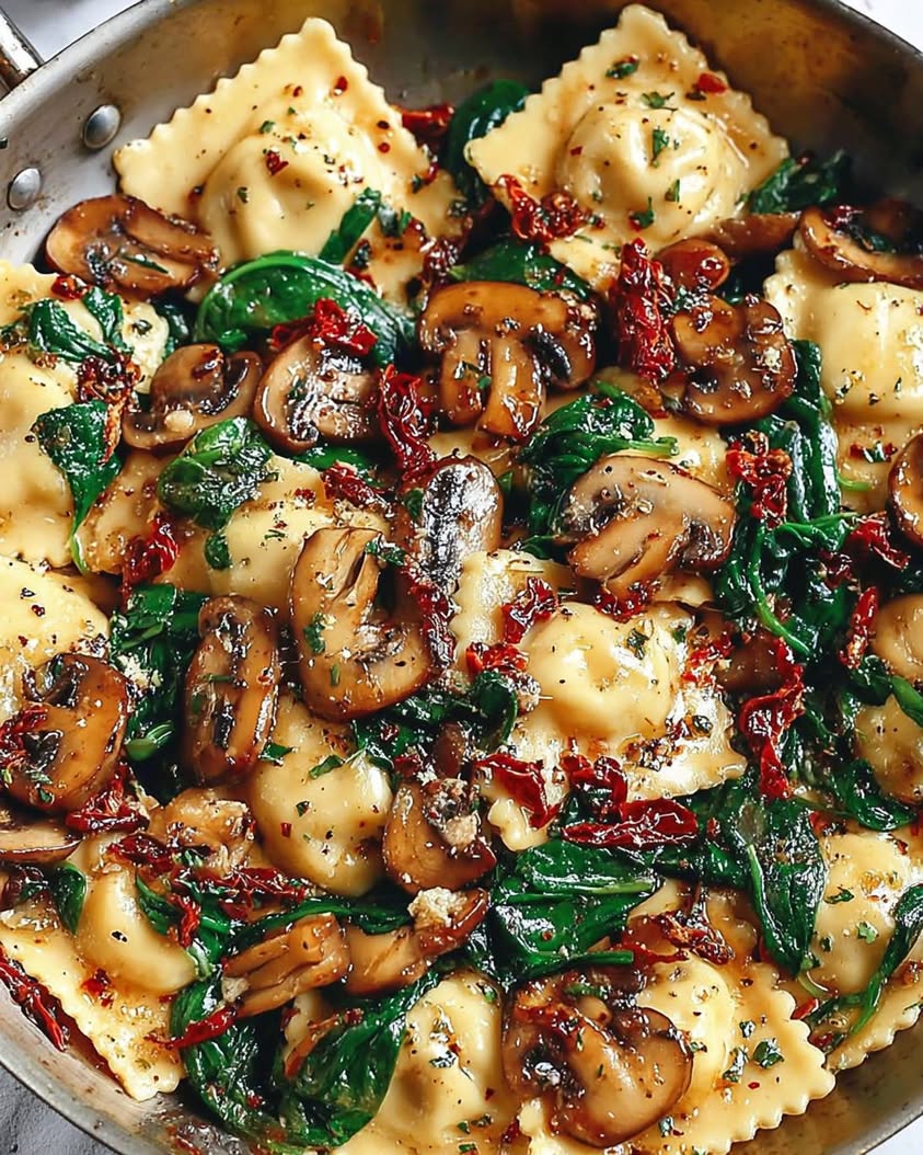 Cheesy Ravioli with Spinach Mushrooms and Sun Dried Tomatoes