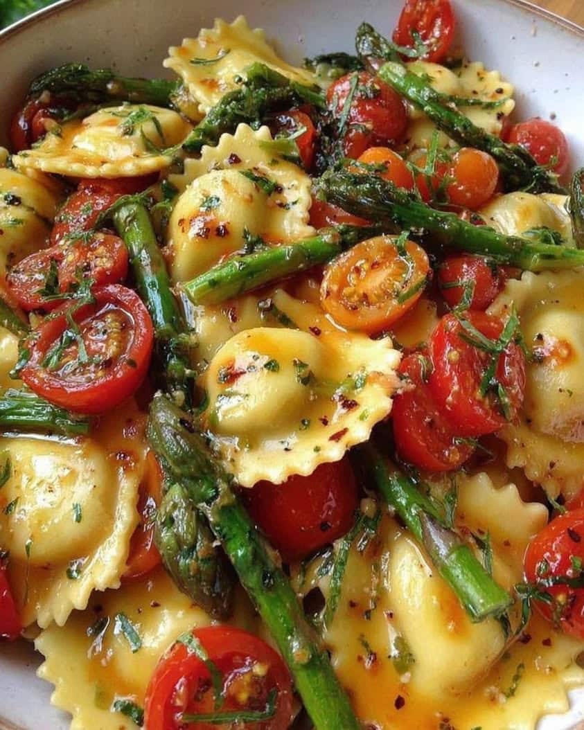 Spring Ravioli with Asparagus, Tomatoes, and Fresh Herbs 5 Ravioli with Tomatoes Asparagus Garlic and Herbs