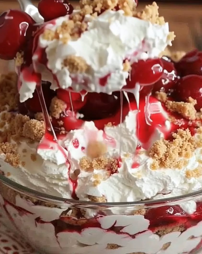 Fluffy whipped topping folded with velvety cream cheese and sweet cherry pie filling—no baking just chill and scoop