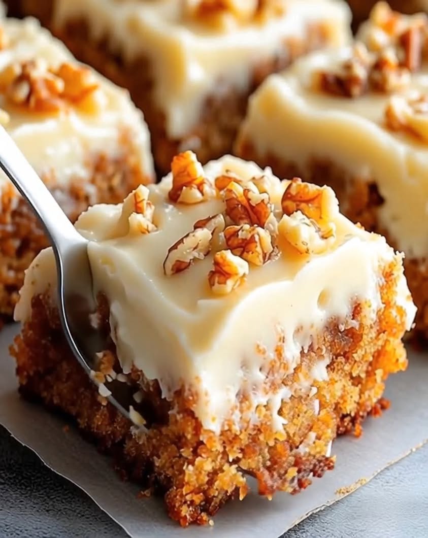 Soft moist perfectly spiced bars topped with tangy cream cheese frosting—straight up cozy bakery style comfort