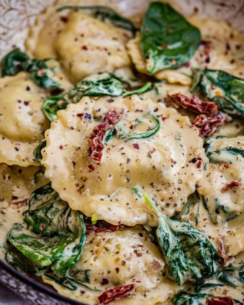 Tuscan Inspired Creamy Ravioli with Spinach and Sun Dried Tomatoes