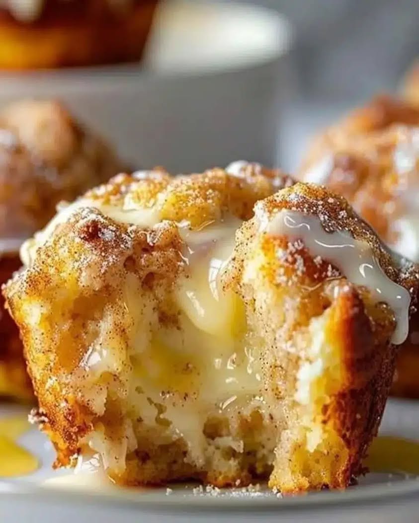 Warm cinnamon spiced muffins with a hidden creamy cream cheese center in every bite—bakery level comfort in about 35 min