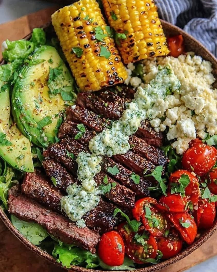 Steak and Avocado Bowl with Roasted Corn and Cilantro Cream