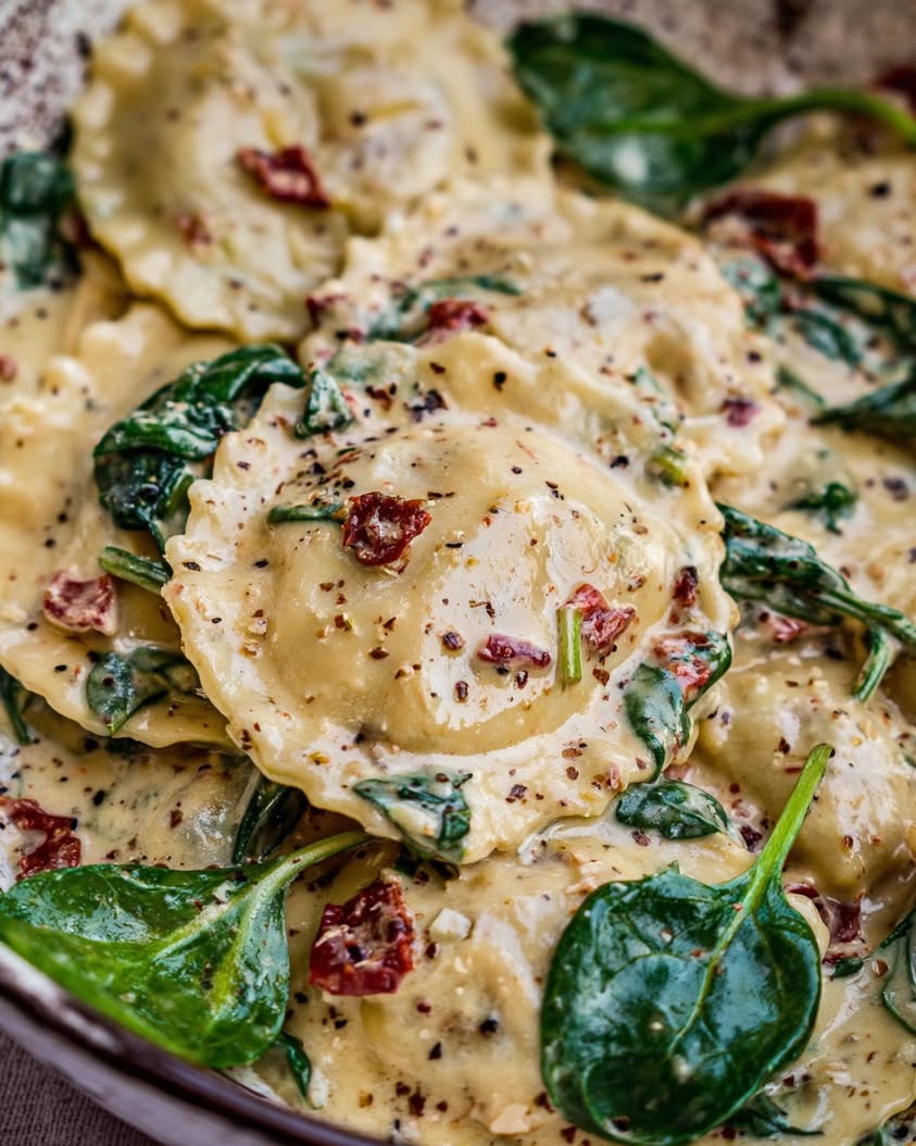 Tuscan Inspired Creamy Ravioli with Spinach and Sun Dried Tomatoes