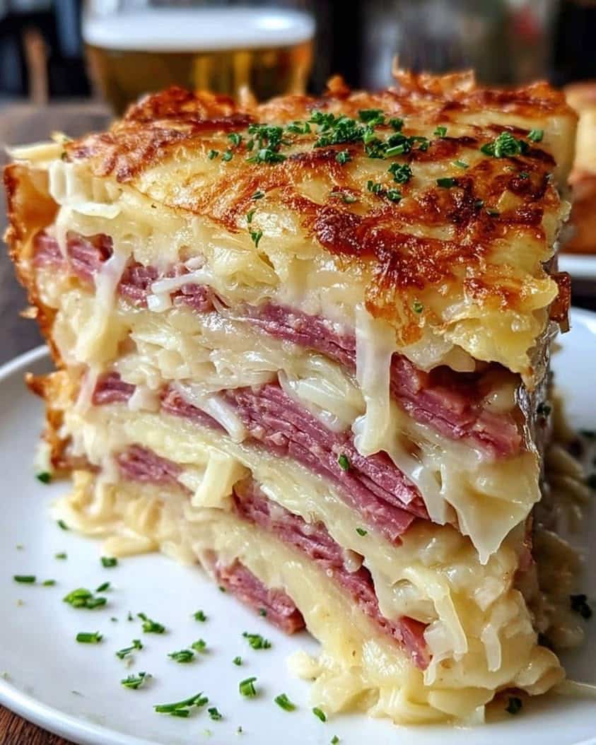 The Ultimate Reuben Bake Recipe with Corned Beef and Swiss Cheese 2 Reuben Bake with Layers of Corned Beef Sauerkraut and Swiss Cheese